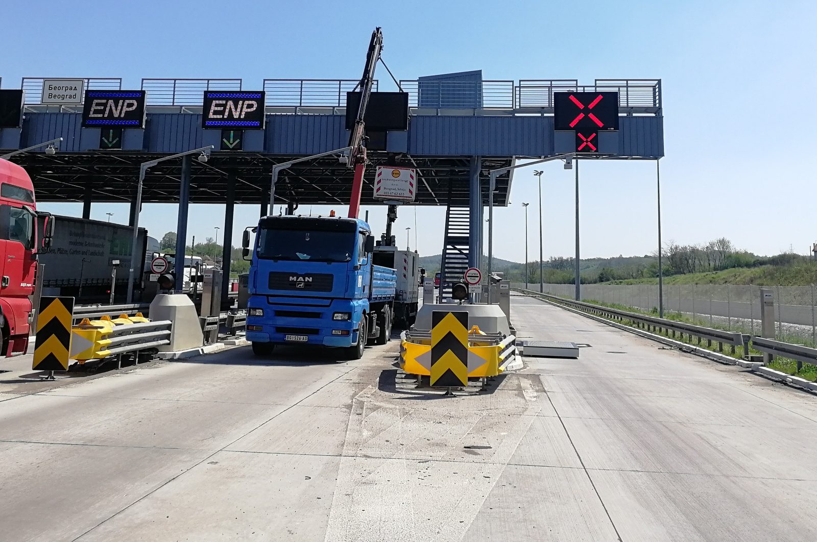 Lane control signals at a toll plaza